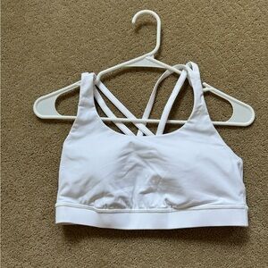 Lululemon sports bra. Light support. White. Size 10. NWOT.